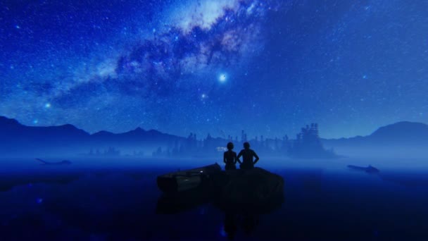 Couple Sitting Rock Isolated Cottage Mountain Range Starry Sky Tilt — Stock Video