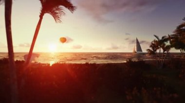 İnsanlar sunrise, hava ballon ve geçen yat plaj