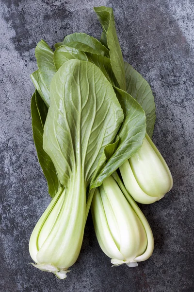 Bok Choi Top View over Dark Slate — Stock Photo, Image