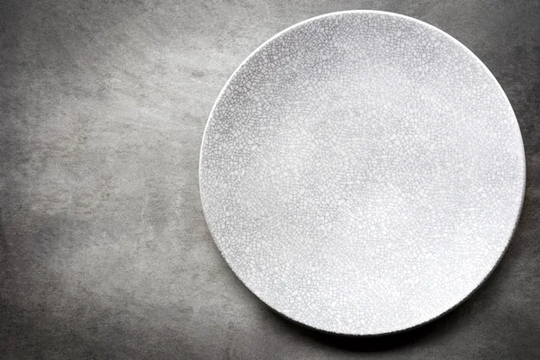 Empty Plate over Slate Top View — Stock Photo, Image