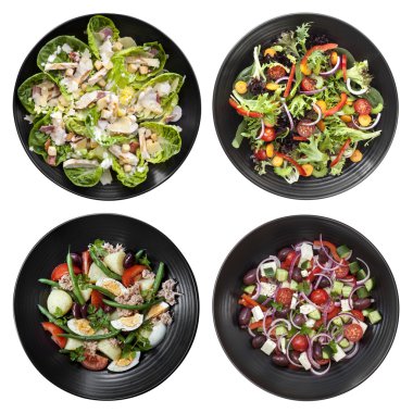 Beyaz arka plan üzerinde farklı salata kümesi