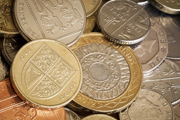 Brytyjskie monety pełny rama tło — Zdjęcie stockowe