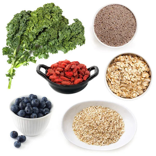 Verschillende Superfoods geïsoleerd op wit — Stockfoto