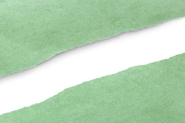 Зеленая бумага разобьется пополам пополам с белой тенью — стоковое фото