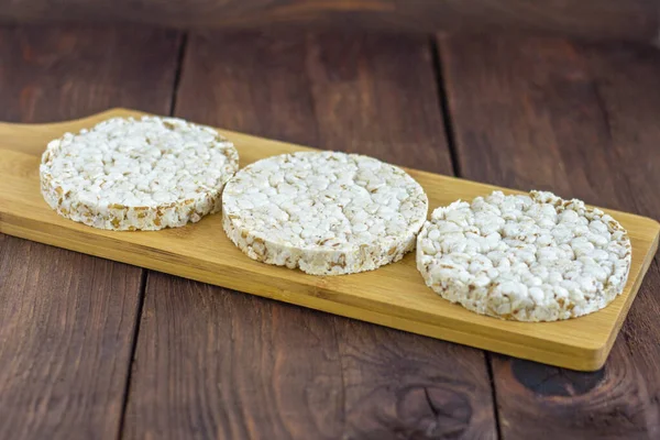 Rice cakes.A few rice cakes on an old wooden background.