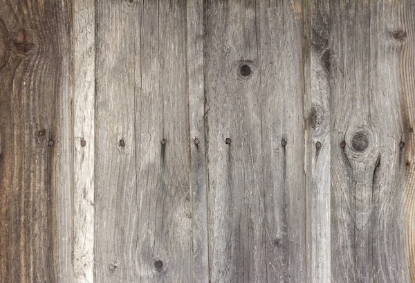 带有裂缝和钉子 深色和风化板的旧木制背景 — 图库照片