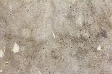 Beton duvar. Soyut desenli beton gri zemin. Duvar kağıdındaki çatlaklar ve kalıntılar..