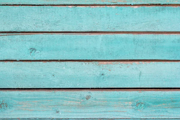 Vieux mur en bois peint en bleu, fond en bois altéré avec des clous et des fentes. — Photo