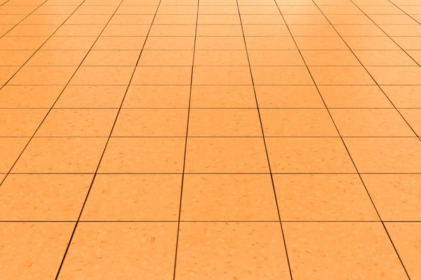橙色的平铺的地板背景 — 图库照片