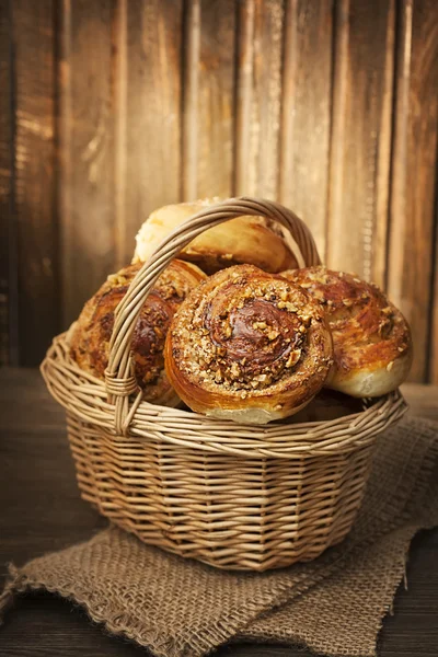 Homemade buns in a basket — Stock Photo, Image