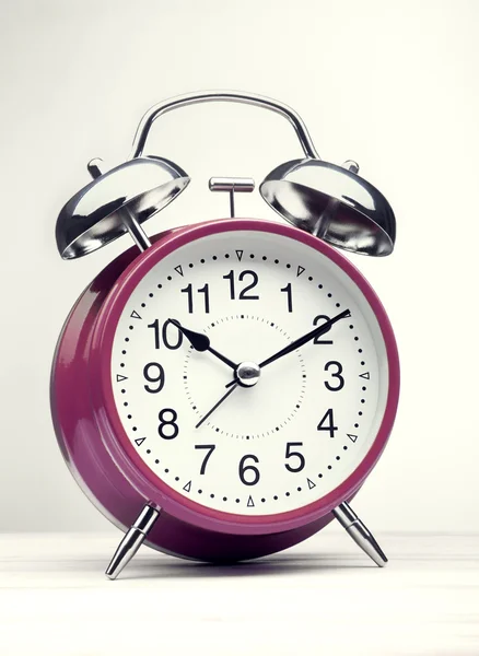 Green alarm clock morning wake-up time Stock Image