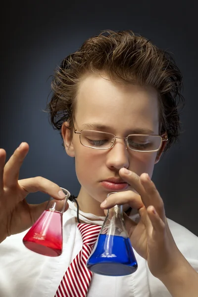 Funny emotional chemist with two flasks — Stock Photo, Image