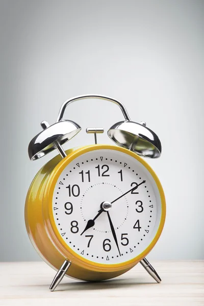 Green alarm clock morning wake-up time — стоковое фото