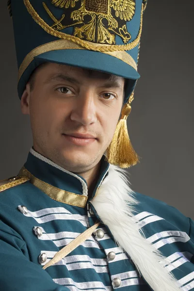 Russische hussar op grijze achtergrond — Stockfoto