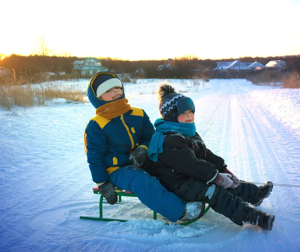 Happy boy with sled — Stock Photo, Image