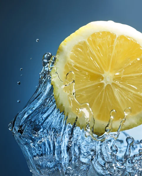 Orange citrus in blue water — Stock Photo, Image