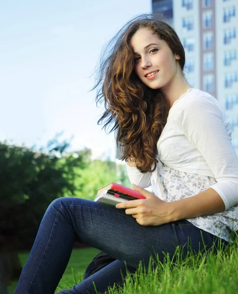 Student Outdoors Holding Notebook Smiling — Stock Photo, Image