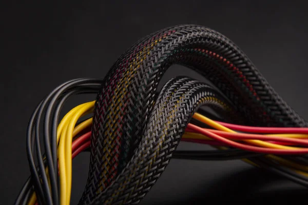 Black Cable Snake Skin Black Braided Wires Bundle Black Background — 스톡 사진