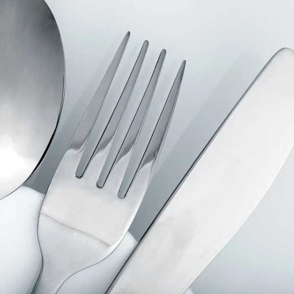 Silverware  on white table — Stock Photo, Image