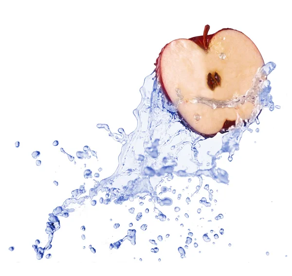 Red apple in juice stream — Stock Photo, Image
