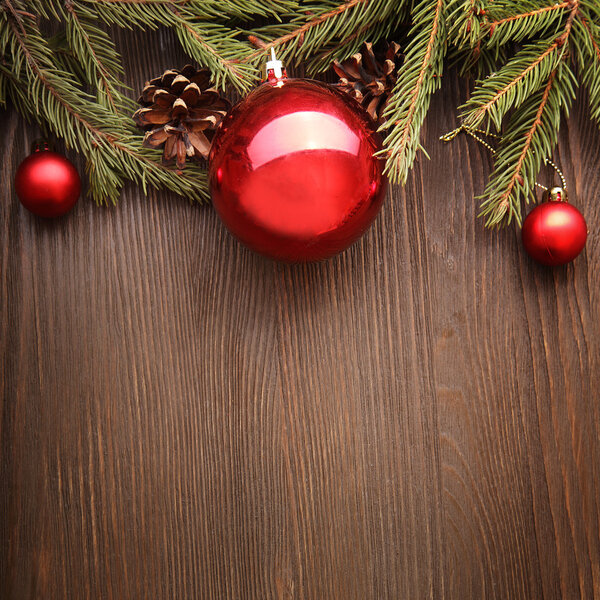 Christmas Tree and decorations on wooden background 