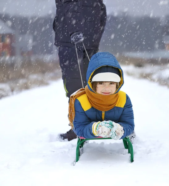 Happy boy with sled — Stock Photo, Image