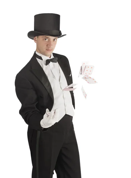 Magician holding playing cards — Stock Photo, Image