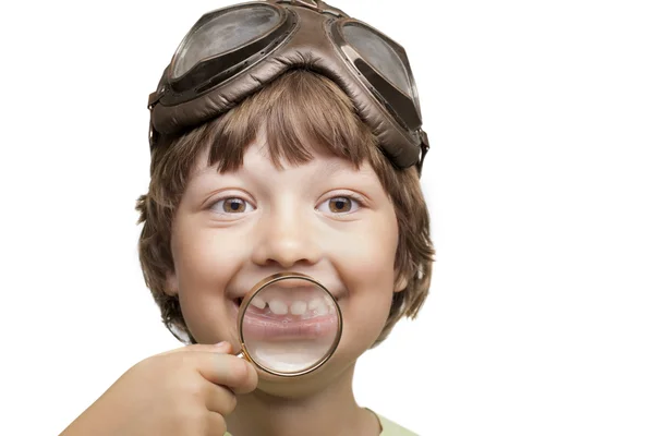 Happy boy with magnifying glass — Stock Photo, Image