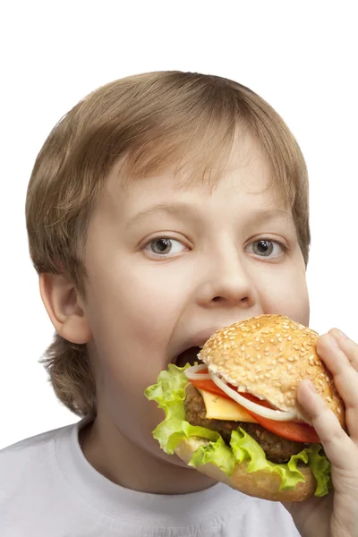 ハンバーガーの男の子 — ストック写真