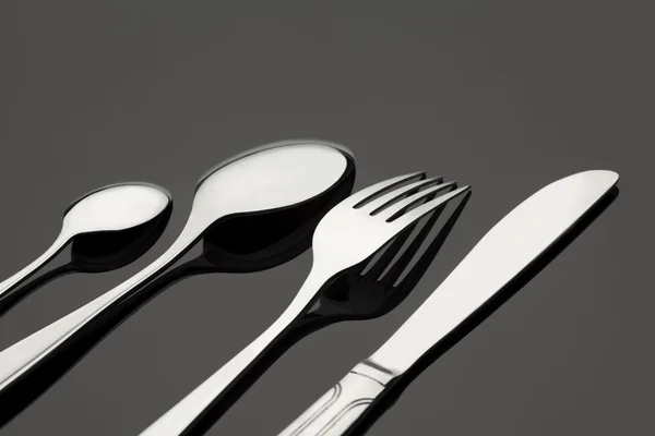 Silverware on white table — Stock Photo, Image