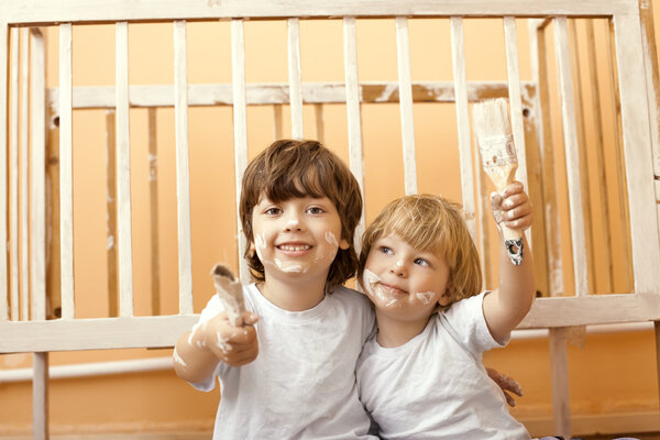 two boys with brush