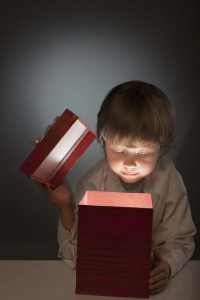 Happy boy open gift-box — Stock Photo, Image