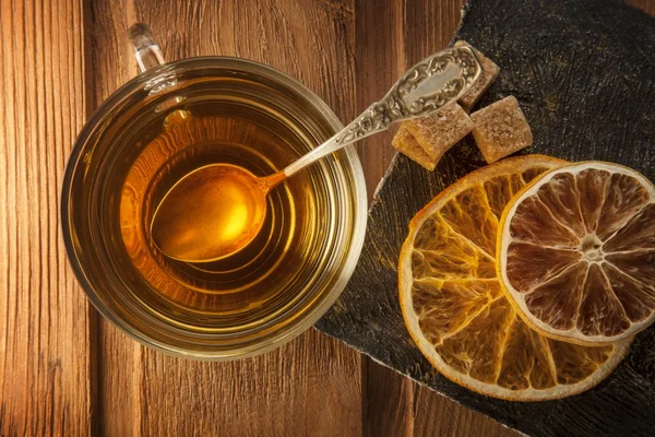 stock image tea sweet sugar on wooden table (top view)