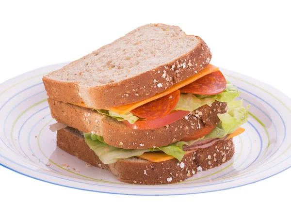 Dreistöckiges Sandwich auf einem Teller — Stockfoto