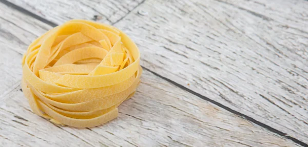 Dried Tagliatelle Pasta — Stock Photo, Image