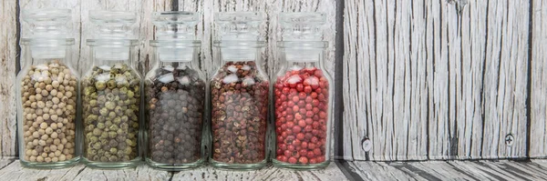 Peppercorns Variety In Glass Vial — Stock Photo, Image