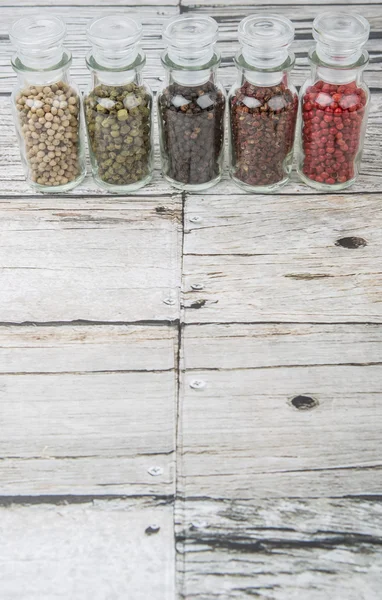 Variedade de pimenta em frasco de vidro — Fotografia de Stock