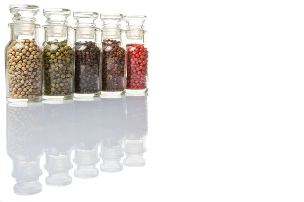 Variedade de pimenta em frasco de vidro — Fotografia de Stock