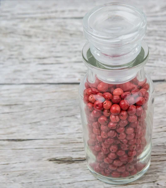 Pink peppercorns Variety In Glass Vial — Stock Photo, Image