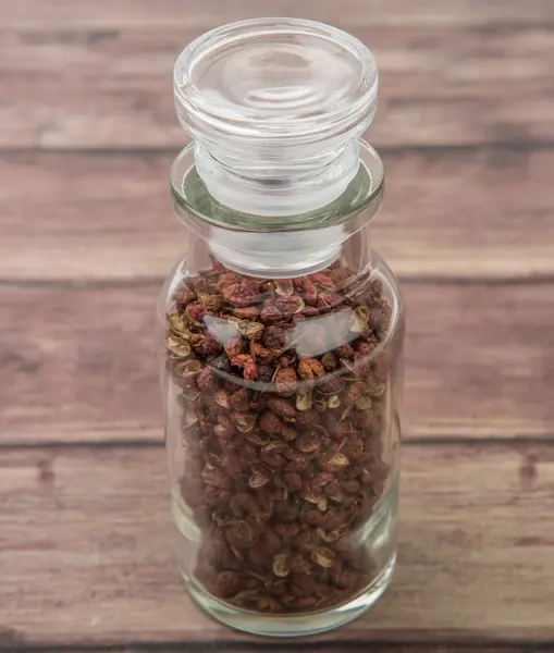 Szechuan Pepper In Glass Vial — Stock Photo, Image