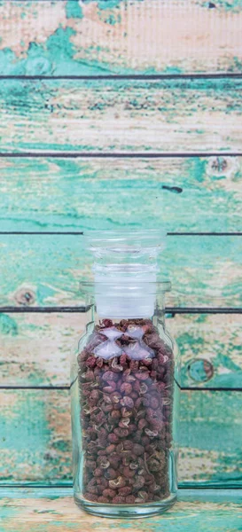 Pimienta de Szechuan en frasco de vidrio — Foto de Stock