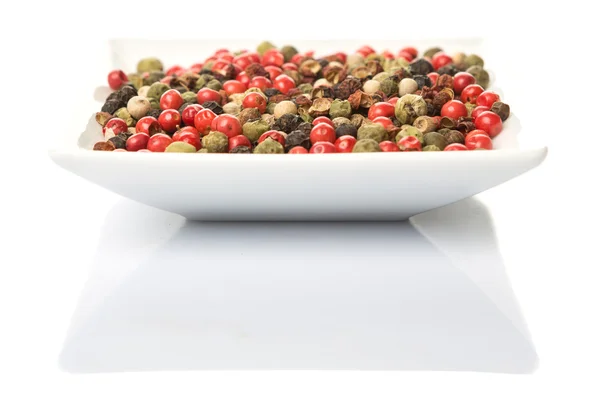 Misture Peppercorn na tigela quadrada — Fotografia de Stock