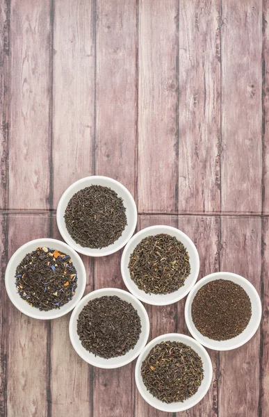 Loose Dried Black Tea Leaves Variety White Bowls Wooden Background — Stock Photo, Image