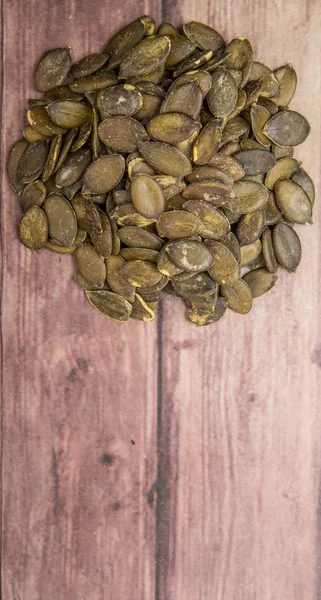 Semillas Calabaza Asadas Sobre Fondo Madera — Foto de Stock