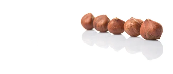 Loupaná skupina lískových ořechů — Stock fotografie