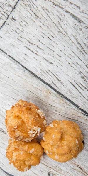 Pastelería Choux espolvoreada con azúcar —  Fotos de Stock