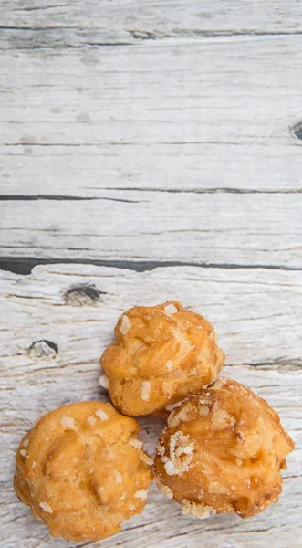 Pastelería Choux espolvoreada con azúcar —  Fotos de Stock