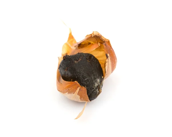 Caramelized cloves of black garlic — Stock Photo, Image