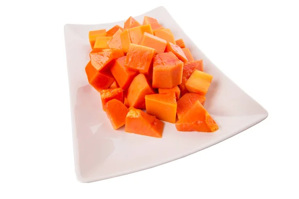 Bita stora papaya frukt på vit platta — Stockfoto