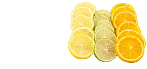 Kalk, citroen en sinaasappel laag segmenten — Stockfoto